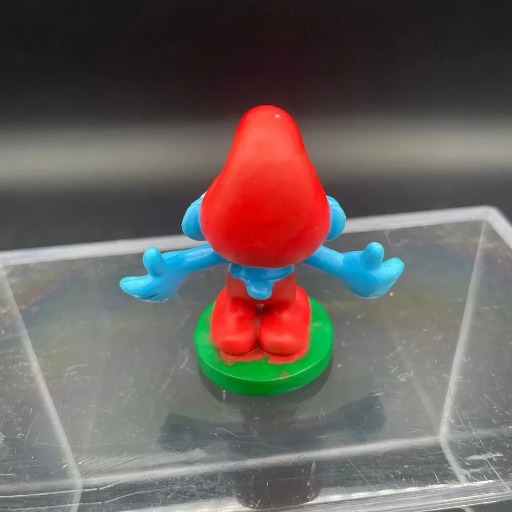Vintage 2010 Peyo Smurf Figurine on Green Base PVC Toy Collectible